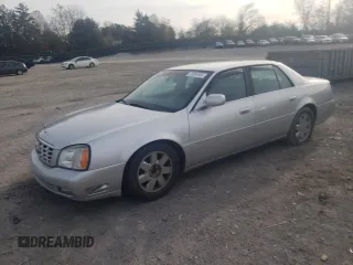 2003 Cadillac DeVille DTS z VIN 1G6KF57973U163124, wystawiony jako Copart lot #78054584 z przebiegiem 111 189 mil mil oraz Szkody całkowita. Historia ofert i sprzedaży dostępna na DreamBid. Obrazek 1.