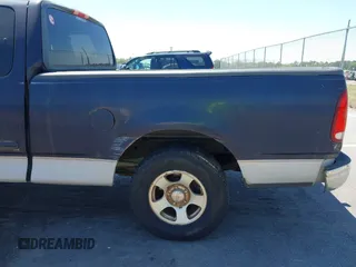 1999 Ford F-150 with VIN 1FTRX17W9XNB32397, listed as a IAAI auction lot 42048746 with 290,179 mi miles and . Bid and sale history available at DreamBid. Image 15.