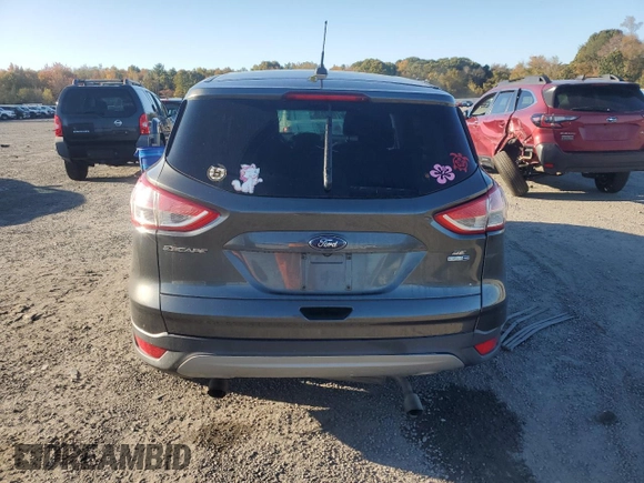2016 Ford Escape SE with VIN 1FMCU9GX0GUB86582, listed as a Copart auction lot 74035344 with 115,538 mi miles and Salvage Title. Bid and sale history available at DreamBid. Image 6.