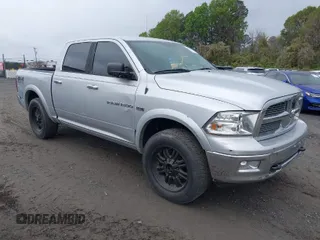 2012 Ram 1500 Outdoorsman with VIN 1C6RD7LT5CS218851, listed as a IAAI auction lot 41902384 with 223,993 mi miles. Bid and sale history available at carsss.com. Image 1.