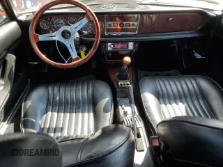 1979 FIAT 124 Spider z VIN 124CS20142625, wystawiony jako Copart lot #63245354 z przebiegiem 41 509 mil mil oraz Tytuł czysty. Historia ofert i sprzedaży dostępna na DreamBid. Obrazek 8.