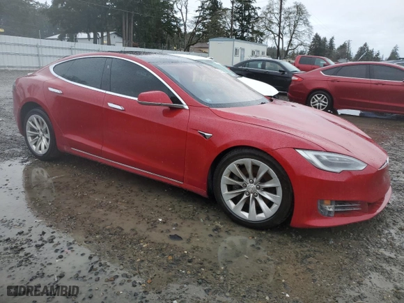 2017 Tesla Model S 100D with VIN 5YJSA1E26HF209598, listed as a Copart auction lot 52162885 with 149,384 mi miles and Salvage Title. Bid and sale history available at carsss.com. Image 4.
