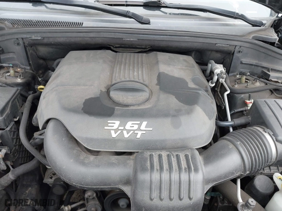 2014 Jeep Grand Cherokee Overland with VIN 1C4RJFCG6EC121654, listed as a IAAI auction lot 42051730 with 163,853 mi miles. Bid and sale history available at carsss.com. Image 10.