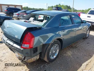 2005 Chrysler 300 with VIN 2C3AA53G35H157083, listed as a IAAI auction lot 41945392 with 192,215 mi miles. Bid and sale history available at carsss.com. Image 4.