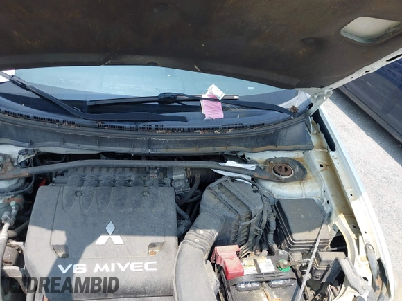 2007 Mitsubishi Outlander LS z VIN JA4MT31X67Z019805, wystawiony jako IAAI lot #42424258 z przebiegiem Nie podano mil oraz . Historia ofert i sprzedaży dostępna na DreamBid. Obrazek 10.