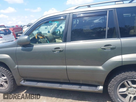 2006 Lexus GX 470 with VIN JTJBT20X560108967, listed as a IAAI auction lot 42702608 with 239,835 mi miles and . Bid and sale history available at DreamBid. Image 14.