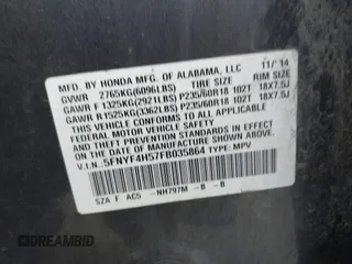 2015 Honda Pilot EX-L with VIN 5FNYF4H57FB035864, listed as a IAAI auction lot 41786445 with 139,787 mi miles and . Bid and sale history available at carsss.com. Image 9.