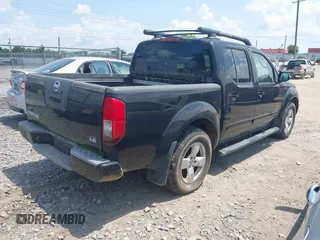 2007 Nissan Frontier SE with VIN 1N6AD07U57C422529, listed as a IAAI auction lot 42547386 with 242,955 mi miles and . Bid and sale history available at DreamBid. Image 4.