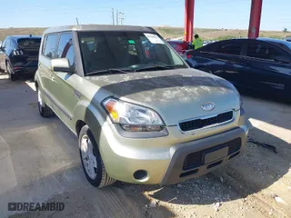 2011 Kia Soul + with VIN KNDJT2A23B7278814, listed as a IAAI auction lot 41998183 with 166,598 mi miles. Bid and sale history available at carsss.com. Image 1.
