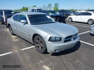 2010 Dodge Charger SXT with VIN 2B3CA3CV4AH253226, listed as a IAAI auction lot 42031664 with 173,785 mi miles. Bid and sale history available at carsss.com. Image 1.