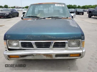 1994 Nissan Frontier with VIN 1N6SD11S2RC341136, listed as a Copart auction lot 57107995 with 174,479 mi miles and Salvage title. Bid and sale history available at DreamBid. Image 5.