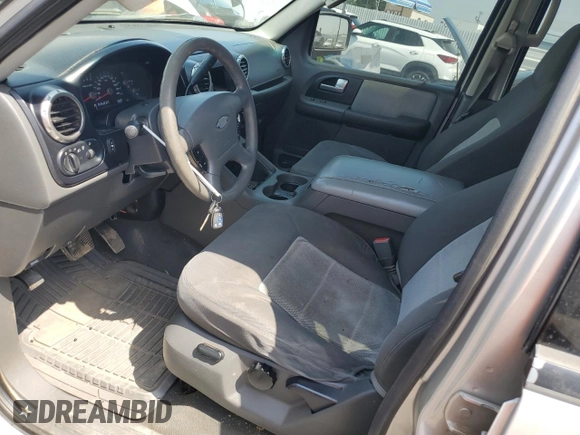 2003 Ford Expedition Special Service with VIN 1FMRU15W43LC14423, listed as a Copart auction lot 58082065 with 182,413 mi miles and Salvage title. Bid and sale history available at DreamBid. Image 7.