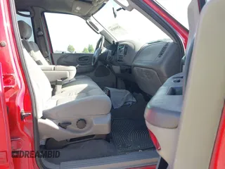 2003 Ford F-150 XLT with VIN 1FTRW08L43KD14456, listed as a IAAI auction lot 42098830 with 234,908 mi miles. Bid and sale history available at carsss.com. Image 5.