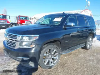 2016 Chevrolet Tahoe LTZ with VIN 1GNSKCKC7GR420945, listed as a IAAI auction lot 41414565 with 134,465 mi miles. Bid and sale history available at carsss.com. Image 2.