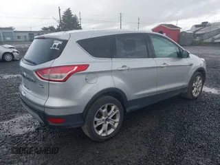 2013 Ford Escape SEL with VIN 1FMCU9H97DUD93157, listed as a IAAI auction lot 41955820 with 244,114 mi miles. Bid and sale history available at carsss.com. Image 4.