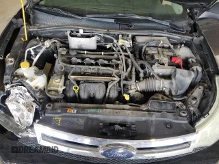 2009 Ford Focus SE z VIN 1FAHP35NX9W221299, wystawiony jako Copart lot #55169125 z przebiegiem 117 477 mil mil oraz Szkoda całkowita • Salvage title. Historia ofert i sprzedaży dostępna na DreamBid. Obrazek 11.