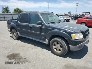 2001 Ford Explorer Sport Trac z VIN 1FMZU77E61UB26259, wystawiony jako Copart lot #62541145 z przebiegiem 258 417 mil mil oraz Czysty tytuł • Clean title. Historia ofert i sprzedaży dostępna na DreamBid. Obrazek 4.