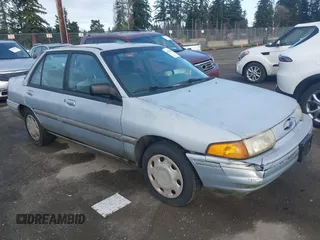 1994 Ford Escort z VIN 3FARP13J7RR154091, wystawiony jako IAAI lot #41765286 z przebiegiem 86 247 mil mil oraz . Historia ofert i sprzedaży dostępna na DreamBid. Obrazek 1.