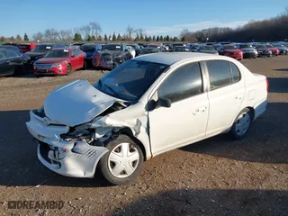 2003 Toyota ECHO with VIN JTDBT123735048163, listed as a IAAI auction lot 41049106 with NaN miles. Bid and sale history available at carsss.com. Image 18.