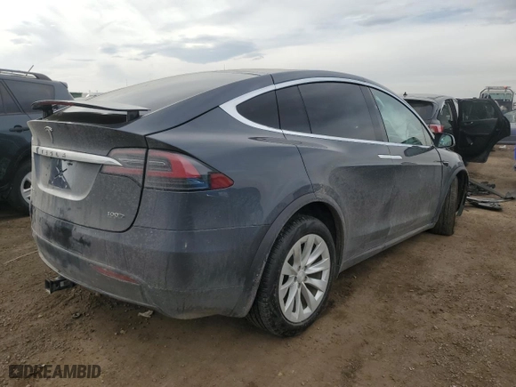 2017 Tesla Model X 90D with VIN 5YJXCDE21HF060258, listed as a Copart auction lot 43822855 with NaN miles and Salvage Title. Bid and sale history available at carsss.com. Image 3.