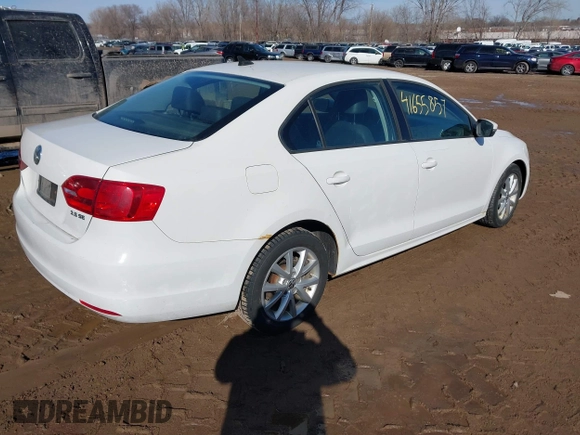 2012 Volkswagen Jetta Sedan SE w/Convenience PZEV with VIN 3VWDP7AJ3CM356826, listed as a IAAI auction lot 41655857 with 163,216 mi miles. Bid and sale history available at carsss.com. Image 4.