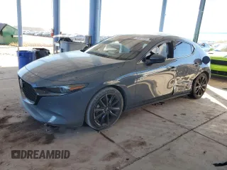 2019 Mazda Mazda3 Hatchback w/Premium Pkg with VIN JM1BPBNM9K1125071, listed as a Copart auction lot 86589954 with 63,157 mi miles and Salvage Title. Bid and sale history available at carsss.com. Image 1.