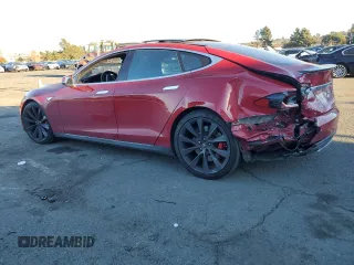 2015 Tesla Model S 85D with VIN 5YJSA1E40FF114095, listed as a Copart auction lot 84114284 with 114,882 mi miles and Salvage Title. Bid and sale history available at carsss.com. Image 2.