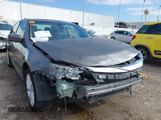 2012 Ford Fusion SE z VIN 3FAHP0HG0CR436745, wystawiony jako IAAI lot #41598812 z przebiegiem 116 305 mil mil oraz . Historia ofert i sprzedaży dostępna na DreamBid. Obrazek 6.