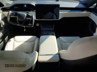 2021 Tesla Model S Plaid с VIN 5YJSA1E69MF446924, выставлен на аукционе Copart как лот 87644725 с пробегом 2 530 миль миль и Списание • Salvage title. История ставок и продаж доступна на DreamBid. Изображение 8.