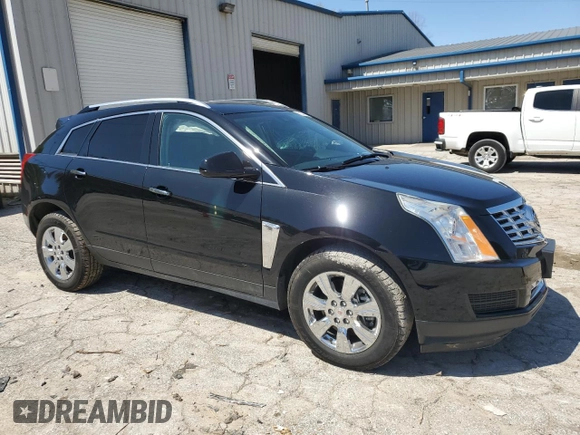 2014 Cadillac SRX Luxury Collection z VIN 3GYFNEE32ES647165, wystawiony jako Copart lot #52331335 z przebiegiem 27 277 mil mil oraz Szkoda całkowita • Salvage title. Historia ofert i sprzedaży dostępna na DreamBid. Obrazek 4.