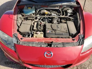 2005 Mazda RX-8 z VIN JM1FE173450158530, wystawiony jako Copart lot #51755695 z przebiegiem 144 048 mil mil oraz Szkoda całkowita • Salvage title. Historia ofert i sprzedaży dostępna na DreamBid. Obrazek 11.
