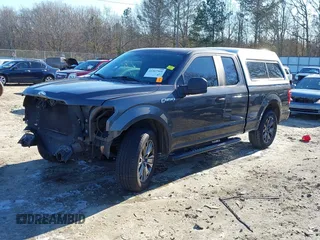 2015 Ford F-150 XL with VIN 1FTEX1C85FKD46390, listed as a IAAI auction lot 41367960 with 209,889 mi miles. Bid and sale history available at carsss.com. Image 2.