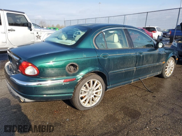 2007 Jaguar X-Type z VIN SAJWA51A17WJ20376, wystawiony jako Copart lot #52513655 z przebiegiem 162 104 mil mil oraz Tytuł czysty. Historia ofert i sprzedaży dostępna na DreamBid. Obrazek 3.