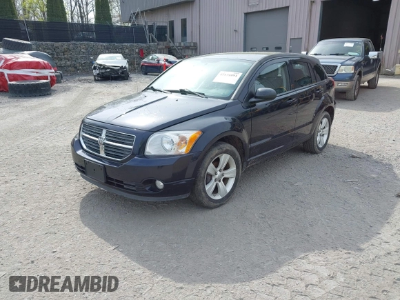 2011 Dodge Caliber Mainstreet with VIN 1B3CB3HA6BD121439, listed as a IAAI auction lot 42131091 with 92,850 mi miles. Bid and sale history available at carsss.com. Image 2.