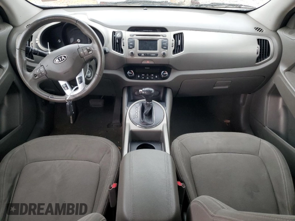 2012 Kia Sportage EX with VIN KNDPC3A2XC7192367, listed as a Copart auction lot 57698365 with 106,730 mi miles and Salvage title. Bid and sale history available at DreamBid. Image 8.