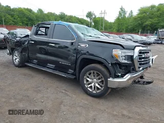 2022 GMC Sierra 1500 SLT with VIN 3GTU9DET9NG211816, listed as a IAAI auction lot 42351877 with 63,503 mi miles and . Bid and sale history available at DreamBid. Image 1.