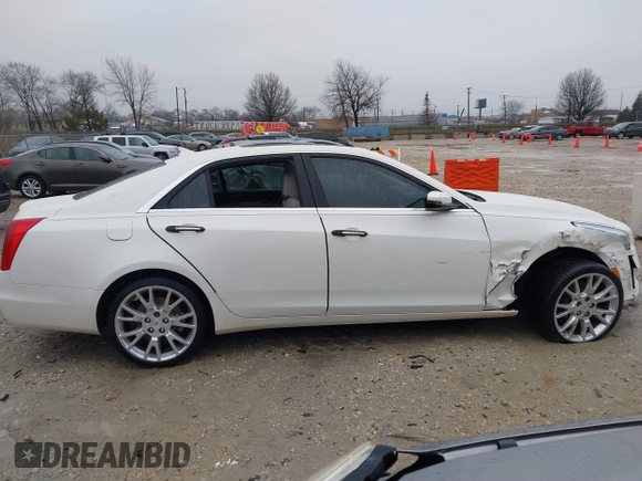 2014 Cadillac CTS Luxury AWD with VIN 1G6AX5S33E0156239, listed as a IAAI auction lot 41452922 with Not Provided miles and . Bid and sale history available at DreamBid. Image 14.