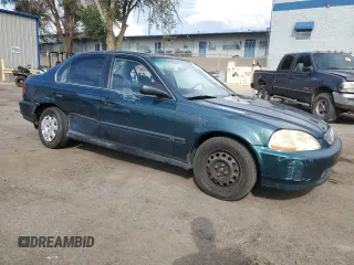 1998 Honda Civic LX with VIN 1HGEJ6673WL011044, listed as a Copart auction lot 69287544 with 172,822 mi miles and Salvage Title. Bid and sale history available at carsss.com. Image 4.