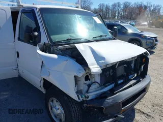 2014 Ford Econoline Cargo Commercial with VIN 1FTSE3EL0EDA04144, listed as a IAAI auction lot 41833930 with 159,405 mi miles. Bid and sale history available at carsss.com. Image 6.