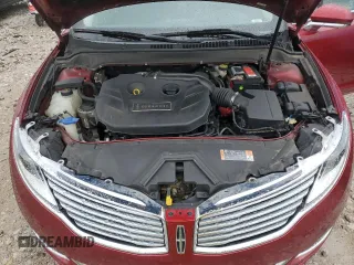 2016 Lincoln MKZ z VIN 3LN6L2J95GR605230, wystawiony jako Copart lot #57844905 z przebiegiem 95 530 mil mil oraz Czysty tytuł • Clean title. Historia ofert i sprzedaży dostępna na DreamBid. Obrazek 11.