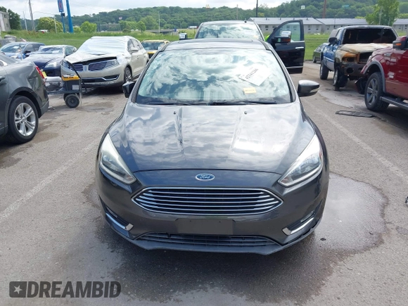 2018 Ford Focus Titanium with VIN 1FADP3N28JL323825, listed as a IAAI auction lot 42341286 with 46,565 mi miles and . Bid and sale history available at DreamBid. Image 12.