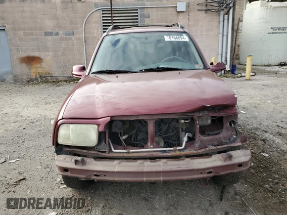 2003 Chevrolet Tracker LT with VIN 2CNBE634136908086, listed as a Copart auction lot 78168894 with 243,614 mi miles and Salvage title. Bid and sale history available at DreamBid. Image 5.