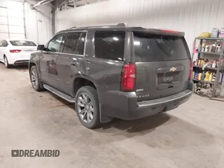 2016 Chevrolet Tahoe LTZ with VIN 1GNSKCKC1GR201155, listed as a IAAI auction lot 42235228 with 184,585 mi miles and . Bid and sale history available at DreamBid. Image 3.