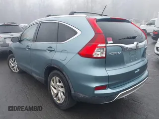 2015 Honda CR-V EX with VIN 2HKRM4H51FH645187, listed as a IAAI auction lot 41883655 with 162,971 mi miles and . Bid and sale history available at DreamBid. Image 3.