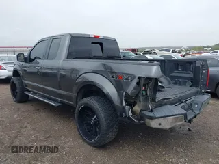 2015 Ford F-150 XLT with VIN 1FTEX1EP9FFC75210, listed as a IAAI auction lot 39041797 with 125,522 mi miles. Bid and sale history available at carsss.com. Image 3.