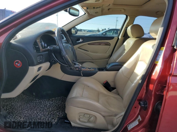 2005 Jaguar S-Type with VIN SAJWA03V451N43191, listed as a Copart auction lot 88491545 with 121,973 mi miles and Salvage Title. Bid and sale history available at DreamBid. Image 7.