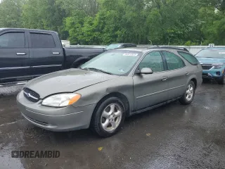 2002 Ford Taurus SE Standard z VIN 1FAFP58U62A219915, wystawiony jako Copart lot #56972825 z przebiegiem 196 453 mil mil oraz Szkoda całkowita • Salvage title. Historia ofert i sprzedaży dostępna na DreamBid. Obrazek 1.