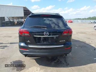 2015 Mazda CX-9 Grand Touring with VIN JM3TB2DA4F0464186, listed as a IAAI auction lot 42227595 with 124,526 mi miles and . Bid and sale history available at DreamBid. Image 16.