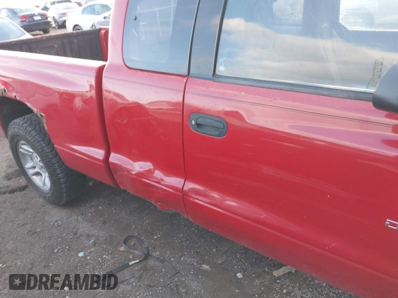 2001 Dodge Dakota Sport with VIN 1B7GL22N11S297957, listed as a IAAI auction lot 41244056 with 193,671 mi miles. Bid and sale history available at carsss.com. Image 12.