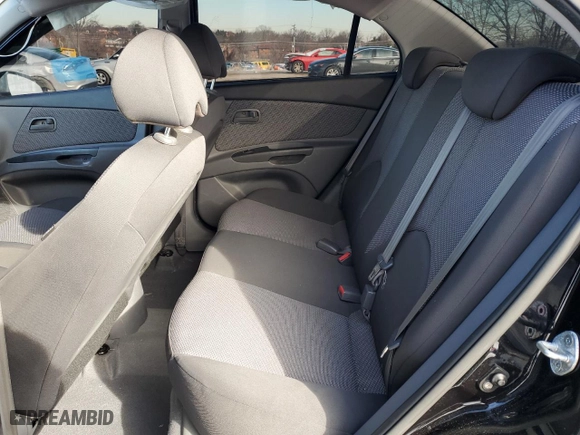 2010 Kia Rio LX with VIN KNADH4A39A6651648, listed as a Copart auction lot 42202755 with 32,617 mi miles and Salvage Title. Bid and sale history available at carsss.com. Image 11.